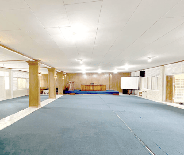 Luxury spa with massage tables, candles, and relaxation area